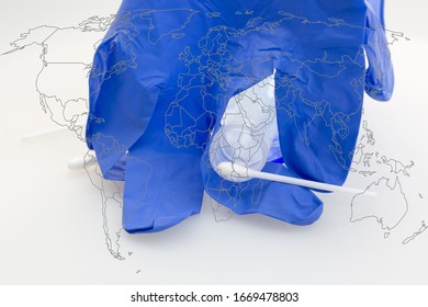 Coronavirus disease 2019 testing to contain the pandemic danger. Medical blue glove, cotton swab, test tube and contours of world map - Powered by Shutterstock