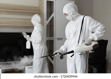 
Coronavirus disinfection. People in hazmats making disinfection in flat, copy space, hot steam disinfection - Powered by Shutterstock