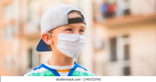 Coronavirus Epidemic. Boy With Protection Facemask. Coronavirus Quarantine. Health Care. Face Mask For Protection Coronavirus Outbreak. Child Wearing A Medicine Mask Outdoors.