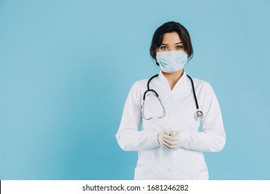 Coronavirus In Europe. Novel Coronavirus (2019-nCoV), Portrait Of The Woman Doctor In Blue Medical Face Mask With Copy Space. Concept Of Covid-19 Quarantine