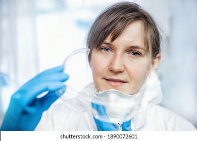 Coronavirus Exhausted Face Doctor Happy Nurse Taking Of Corona Virus Protective Mask Uniform. Concept Safety Medical Professional.