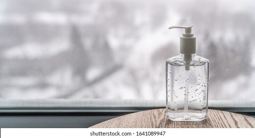 Coronavirus hand sanitizer gel to wash hands for flu virus prevention. Alcohol based antimicrobial disinfectant product for airport, hospital, healthcare and home panoramic banner background. - Shutterstock ID 1641089947