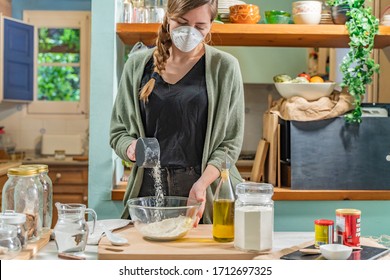 Coronavirus. Isolated Pretty Woman With Face Mask On Quarantine, Cooks In The Kitchen At Home During Coronavirus Crisis. Stay At Home. Enjoy Cooking At Home. Family Concept.
Beautiful Rustic Kitchen.