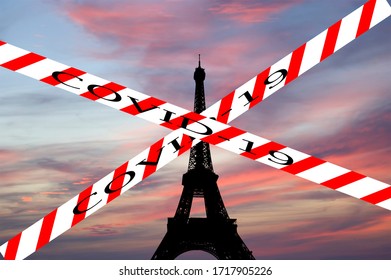 Coronavirus In Paris, France. Covid-19 Sign. Concept Of COVID Pandemic And Travel In Europe. Eiffel Tower In Paris, France