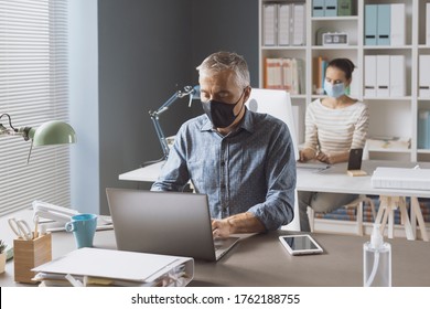 Coronavirus Prevention And Social Distancing In The Office: Business People Keeping Safety Distance And Wearing A Face Mask, Coronavirus Prevention Concept