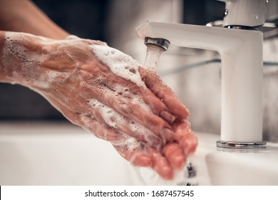 Coronavirus. Proper washing and handling of hands. Liquid antibacterial soap. Self-isolation and hygiene - Shutterstock ID 1687457545