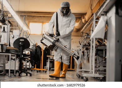 Coronavirus Quarantine. Disinfection and decontamination on a public place and factory as a prevention against Coronavirus disease 2019, COVID-19. State of emergency over pandemia with coronavirus. - Shutterstock ID 1682979526
