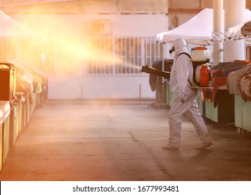 Coronavirus Quarantine. Disinfection, decontamination and spraying on a public place as a prevention against Coronavirus disease 2019, COVID-19. State of emergency over coronavirus. - Shutterstock ID 1677993481