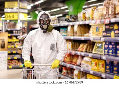 Coronavirus In Russia. People In Biological Suits And Masks In A Supermarket