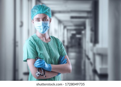 Coronavirus surgical mask doctor with stethoscope wearing face protective mask against coronavirus panoramic medical professional preventive gear at hospital clinic. Nurse Doctor clinical treatment - Powered by Shutterstock