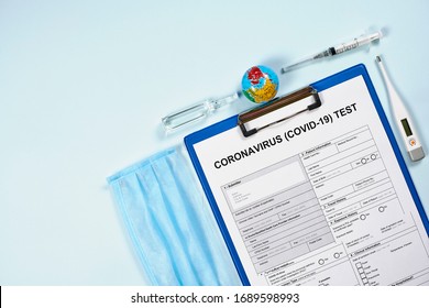 Coronavirus Test Form. Getting The COVID-19 Test. Testing For 2019-ncov. Medical Test Form For New Corona Virus With Medical Supplies And Equipment - Thermometer, Syringe And Ampule