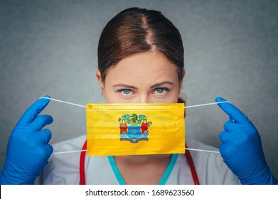 Coronavirus in U.S. State New Jersey, Female Doctor Portrait, protect Face surgical medical mask with New Jersey Flag. Illness, Virus Covid-19 in New Jersey
