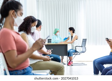 Coronavirus Vaccination. Diverse Patients People Waiting For Covid-19 Vaccine Sitting In Queue In Hospital Waiting-Room. Corona Virus Prevention, Medical Immunization Campaign. vaccinate coronavirus - Powered by Shutterstock