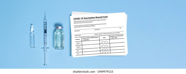 Coronavirus Vaccination Record Card. Covid-19 Corona Virus Vaccination With Vaccine Bottle And Syringe Injection. Immune Passport Or Certificate For Travel Concept.