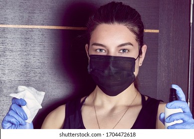 Coronavirus. Woman in quarantine for coronavirus wearing protective mask and plastic gloves.