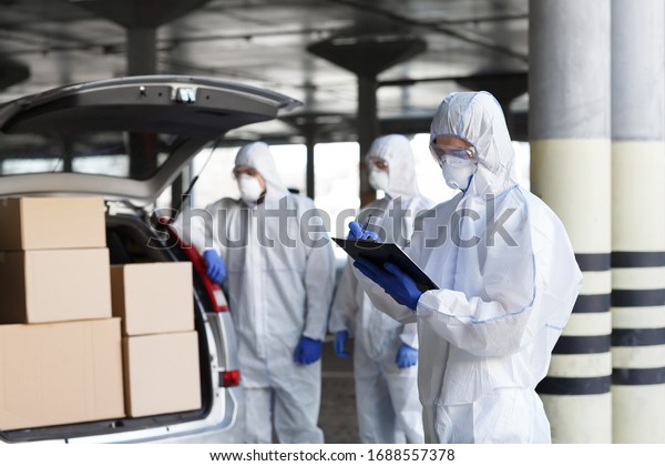 Coronavirus, World Pandemic, Covid-19.
Virologists delivering vaccine to people on car, copy
space