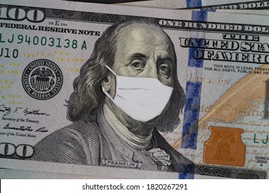 Coronovirus crisis concept - money of USA with protective mask on it. Stack of dollars banknotes on wooden table. USA 100 usd - Shutterstock ID 1820267291