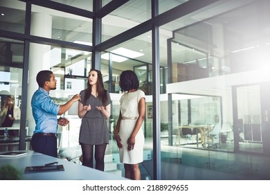 Corporate, business and serious people discussing a strategy and talking about their company vision during a meeting in the boardroom. Teamwork and collaboration while sharing ideas - Shutterstock ID 2188929655