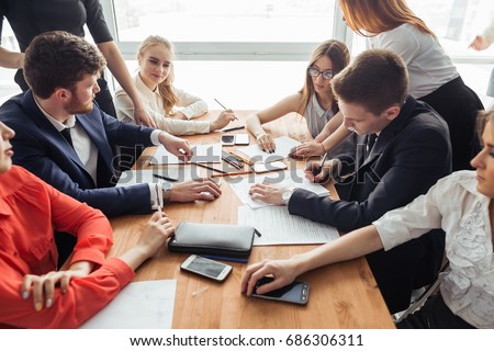 Corporate business team and manager in a meeting, close up