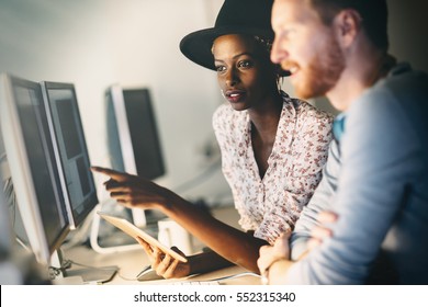 Corporate Coworkers Brainstorming In  Software Development Company