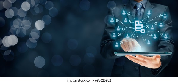 Corporate data management system (DMS) and document management system with privacy theme concept. Businessman think how to protect document connected with users, access rights symbolized by key. - Shutterstock ID 695625982