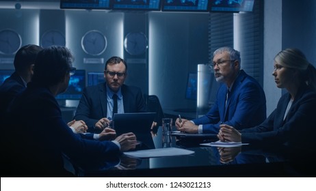 Corporate Executive Debates with His Board of Directors Colleague During Meeting. Serious Business People: Problem Solving, Negotiating and Strategizing in the Conference Room.