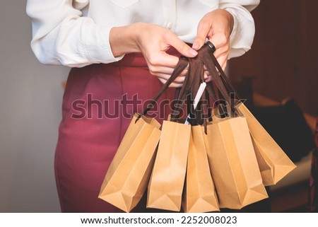 Corporate gifts and souvenirs for employees of the company, gift bag package for conference participants before start, process of presentation of corporate gifts, gift giving at office work