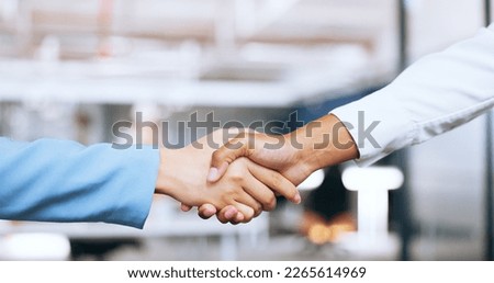 Corporate, partnership and b2b handshake of business people for professional agreement together. Cooperation, welcome or thank you of interracial women employees shaking hands in workplace.