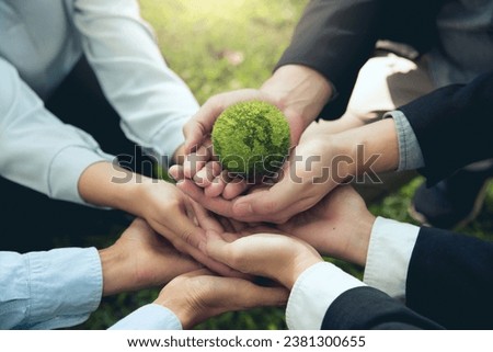 Corporate social responsibility CSR.World Environment Day. business hands holding the green world for the Sustainable Development Goals. Responsibility for the environment. Save and protect the world.