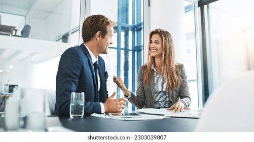 Corporate, staff and employees with collaboration, meeting and feedback in an office, happiness and conversation. Partnership, man and woman with startup success, talking and planning with target - Powered by Shutterstock