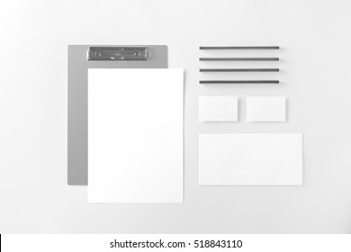 Corporate Stationery Set Mockup. Folder, Letterhead, Two Business Cards And Envelope At White Textured Paper Background. 