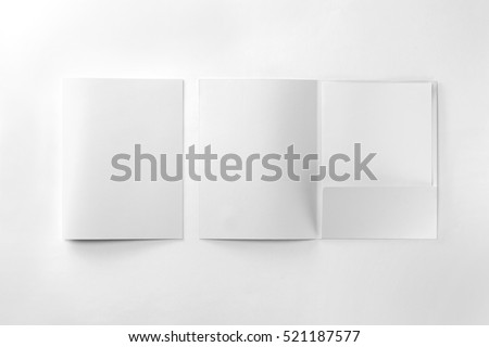 Corporate stationery set mockup. Two presentation folders and letterhead at white textured paper background. 