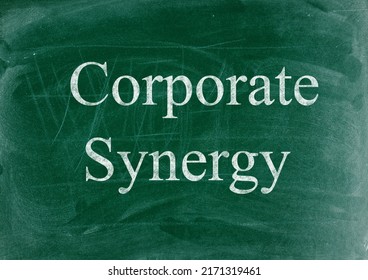 Corporate Synergy Business Phrase Written In Chalk On A Blackboard