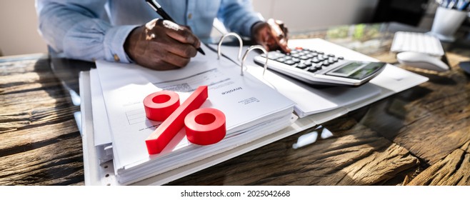 Corporate Tax And Interest Rate Percent. Calculating Percent - Shutterstock ID 2025042668