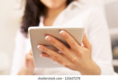 Corporate Woman With Portable Tablet Pc On Her Hand