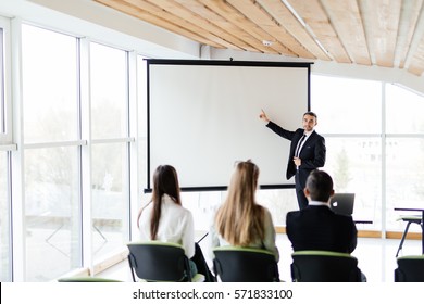 Corporate work. Big presentation on conference room, Training or education seminar. - Shutterstock ID 571833100