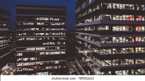 Corporation Office Buildings At Night. Late Working