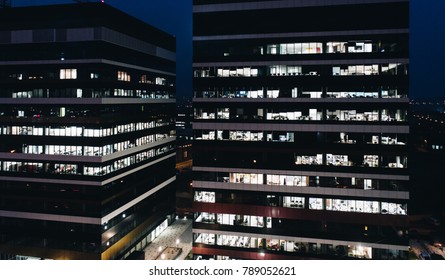 Corporation Office Buildings At Night. Late Working