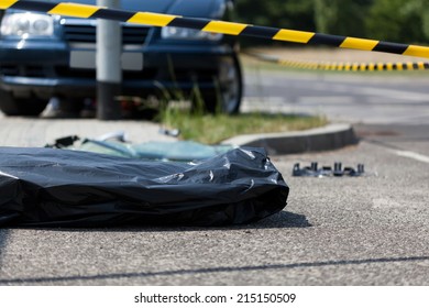 Corpse In Plastic Bag After Car Accident, Horizontal