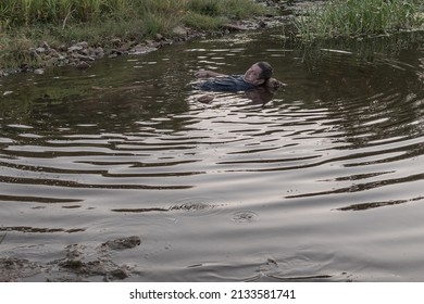 A Corpse In The Water, The Body Of A Dead Man Was Found By The Lake Near The Pond, A Drowned Man Was Found.