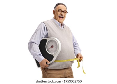 Corpulent mature man smiling and holding a scale and a measuring tape isolated on white background