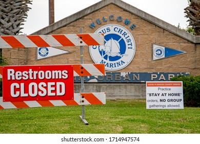 Corpus Christi, Tx/USA-4/17/2020: Signs Deliver The News That The Marina Restrooms Are Closed Because Of The Stay At Home Order, Corpus Christi, Tx Marina