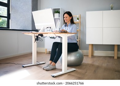 Correct Posture At Desk In Office Using Fitness Ball - Powered by Shutterstock