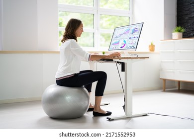 Correct Posture At Desk In Office Using Fitness Ball - Shutterstock ID 2171552953