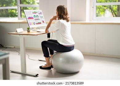 Correct Posture At Desk In Office Using Fitness Ball