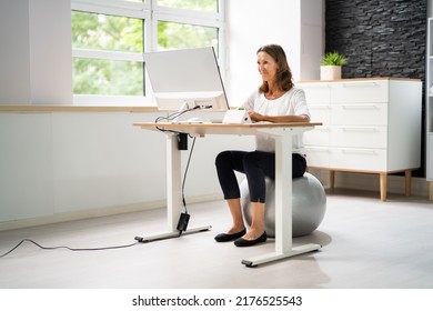 Correct Posture At Desk In Office Using Fitness Ball