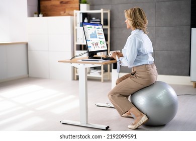 Correct Posture At Desk In Office Using Fitness Ball