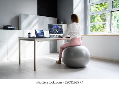 Correct Posture At Desk In Office Using Fitness Ball