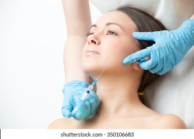 Correcting Injection In The Chin Of Young Woman Face