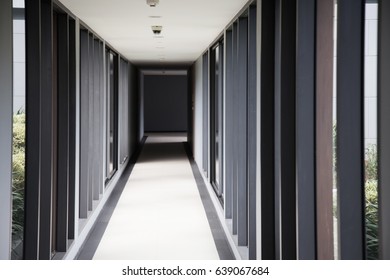 corridor with blank wall and blank signage for your text